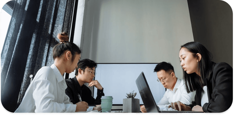 StoryMint team collaborating in the office